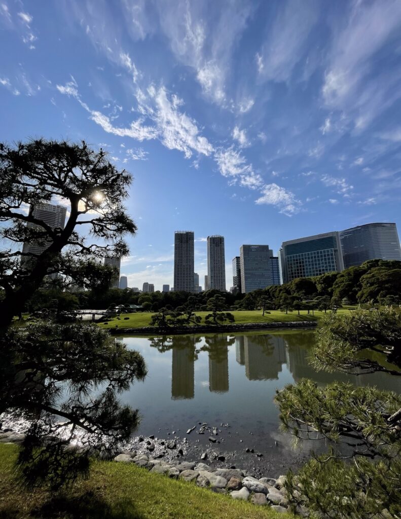 Trees overlook the calm lake in the peaceful Hama-rikyu Gardens in Tokyo. © copyright Matthew Brace