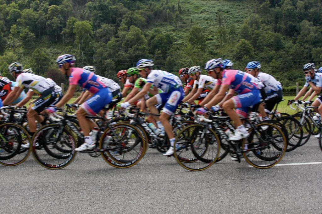 The colourful blur of the peloton as the Tour de France flies past in the Vallée d’Ossau in southern France. © copyright Matthew Brace